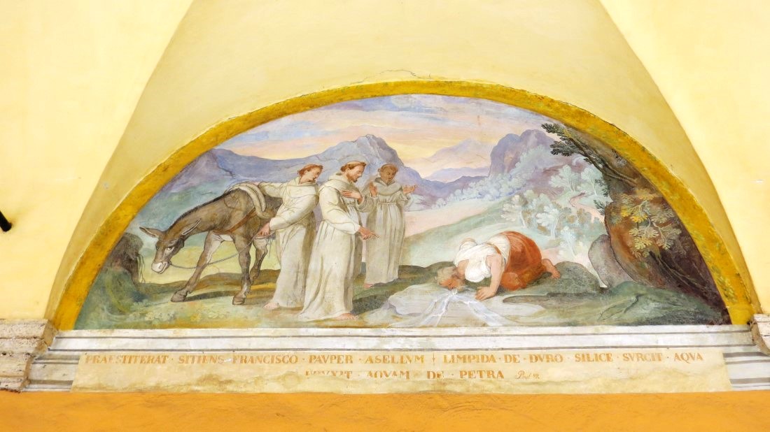 Franziskus wirkt ein "Wasserwunder" um den Durst des armen Mannes, der ihn mit seinem Esel begleitet, zu stillen.